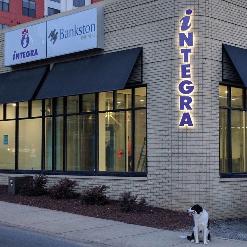 exterior view of integra staffing building with a dog in front of it